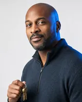 Portrait of Andre, the fictional persona of the Credentials Agent, an AI agent