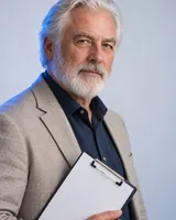 Portrait of Alasdair, the fictional persona of the Program Director, an AI agent