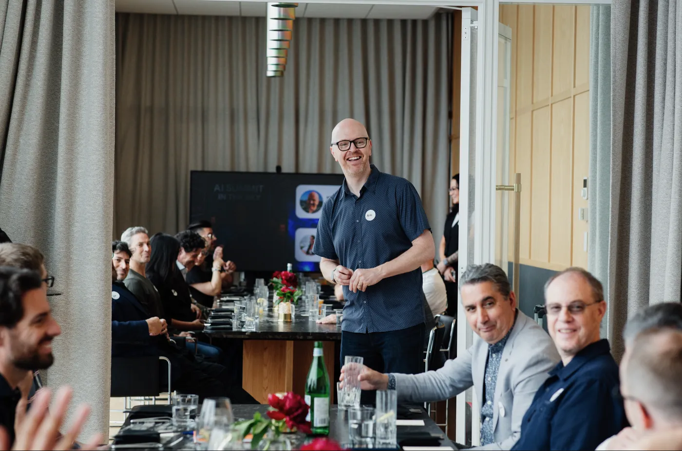 Mike Schwarz with founders and CEOs around the table at a past MyZone AI briefing